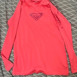 Like new women’s pink Roxy long sleeve rashguard sun shirt